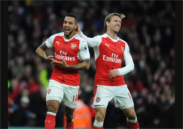 Arsenal's Walcott and Monreal Celebrate Goals Against AFC Bournemouth (2016 / 17)