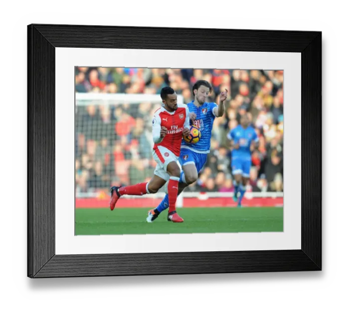 Framed Print : Arsenal vs. AFC Bournemouth: Theo Walcott vs. Harry Arter Clash in Premier League Showdown