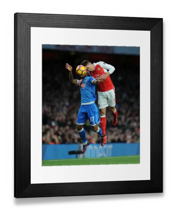 Framed Print : Arsenal's Gabriel Faces Off Against Bournemouth's Joshua King in Premier League Clash Framed Print : Arsenal's Gabriel Faces Off Against Bournemouth's Joshua King in Premier League Clash