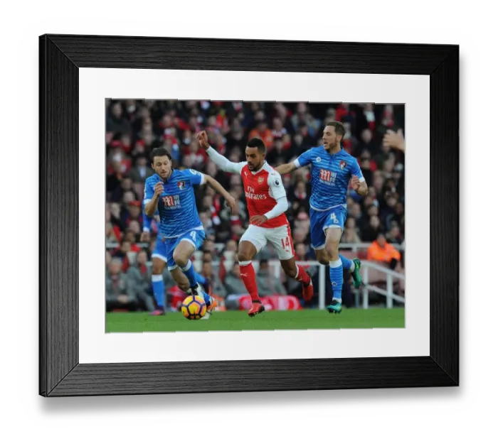Framed Print : Theo Walcott vs. Dan Gosling and Harry Arter: Intense Battle at Arsenal v AFC Bournemouth (2016 / 17)