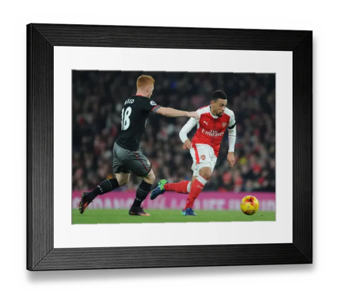 Framed Print : Arsenal vs. Southampton: Coquelin Clashes with Reed in EFL Cup Quarter-Final Framed Print : Arsenal vs. Southampton: Coquelin Clashes with Reed in EFL Cup Quarter-Final
