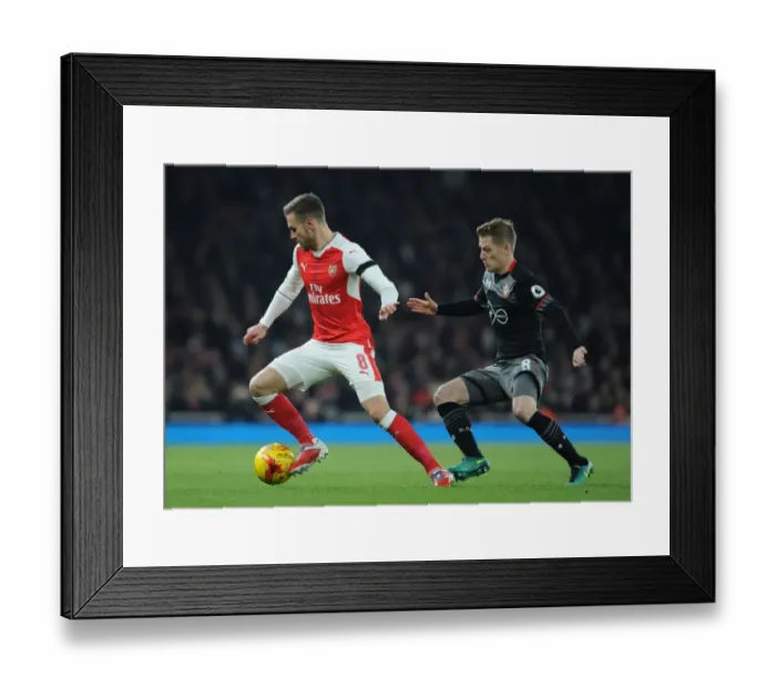 Framed Print : Arsenal's Ramsey Outmaneuvers Southampton's Davis in EFL Cup Quarter-Final Framed Print : Arsenal's Ramsey Outmaneuvers Southampton's Davis in EFL Cup Quarter-Final