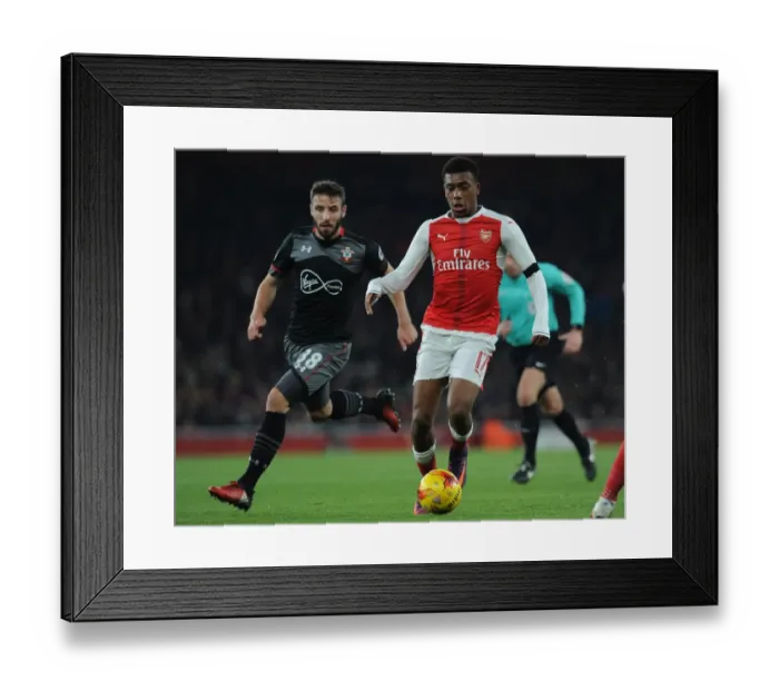 Framed Print : Arsenal's Alex Iwobi Clashes with Southampton's Sam McQueen in EFL Cup Quarter-Final Framed Print : Arsenal's Alex Iwobi Clashes with Southampton's Sam McQueen in EFL Cup Quarter-Final