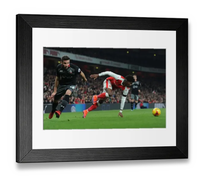 Framed Print : Arsenal's Ainsley Maitland-Niles Faces Off Against Southampton's Sam McQueen in EFL Cup Quarter-Final Framed Print : Arsenal's Ainsley Maitland-Niles Faces Off Against Southampton's Sam McQueen in EFL Cup Quarter-Final