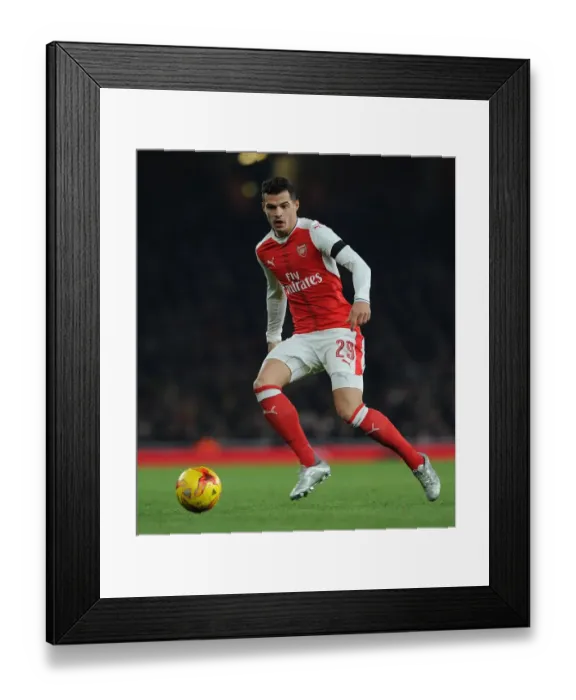 Framed Print : Granit Xhaka: Arsenal's Midfield Maestro in EFL Cup Battle Against Southampton