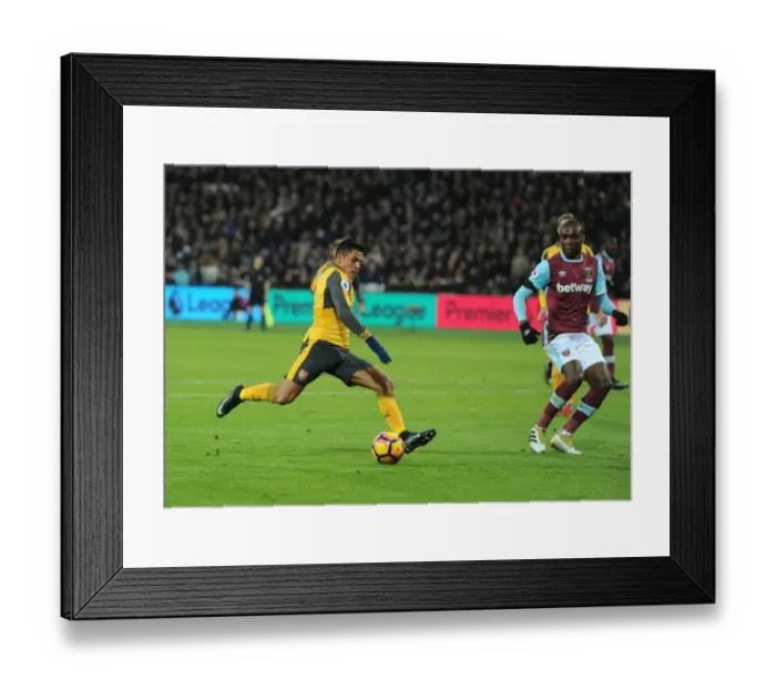 Framed Print : Alexis Sanchez's Decisive Strike: Arsenal's Victory over West Ham United in the Premier League 2016-17