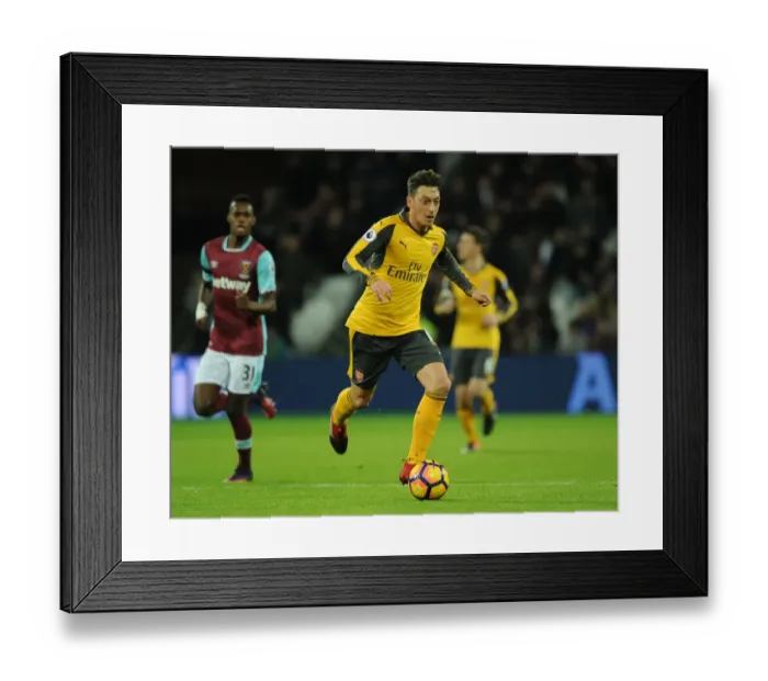 Framed Print : Mesut Ozil in Action: Arsenal vs. West Ham United - Premier League Clash (2016-17)