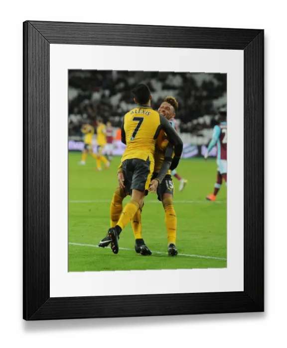 Framed Print : Alexis Sanchez and Alex Oxlade-Chamberlain Celebrate Arsenal's Five-Goal Lead Over West Ham United