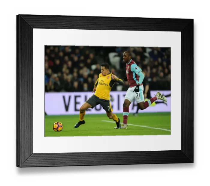 Framed Print : Alexis Sanchez Breaks Past Angelo Ogbonna: West Ham United vs. Arsenal, Premier League 2016-17 Framed Print : Alexis Sanchez Breaks Past Angelo Ogbonna: West Ham United vs. Arsenal, Premier League 2016-17
