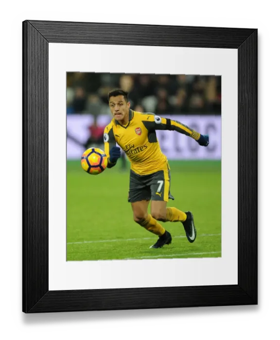 Framed Print : Arsenal's Alexis Sanchez Faces Off Against West Ham in Premier League Clash