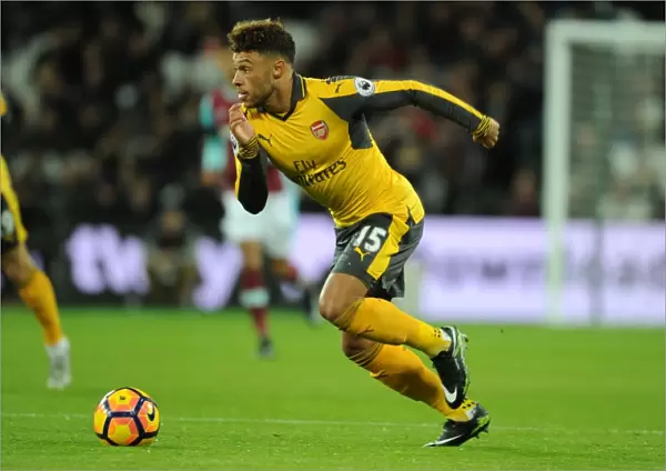 Arsenal's Oxlade-Chamberlain Faces Off Against West Ham in Premier League Battle