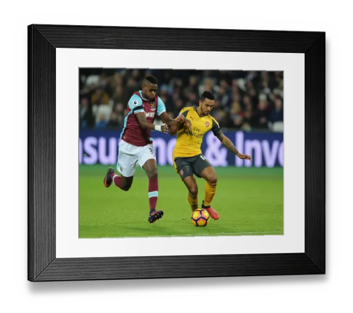 Framed Print : Theo Walcott vs. Edimilson Fernandes: A Battle in the Premier League Clash Between West Ham and Arsenal (December 2016) Framed Print : Theo Walcott vs. Edimilson Fernandes: A Battle in the Premier League Clash Between West Ham and Arsenal (December 2016)