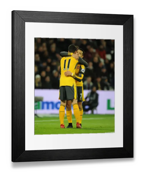 Framed Print : Unstoppable Arsenal Duo: Ozil and Sanchez Score First Goals vs. West Ham United (2016-17)