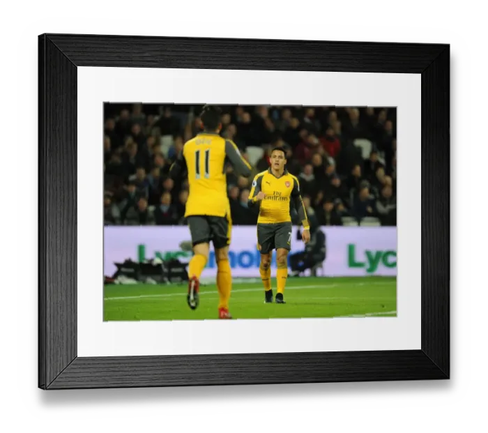 Framed Print : Mesut Ozil and Alexis Sanchez Celebrate Arsenal's First Goal Against West Ham United (2016-17) Framed Print : Mesut Ozil and Alexis Sanchez Celebrate Arsenal's First Goal Against West Ham United (2016-17)