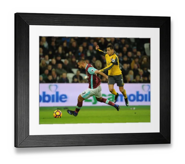 Framed Print : Sanchez vs. Reid: A Premier League Battle at London Stadium - Arsenal vs. West Ham United, 2016-17