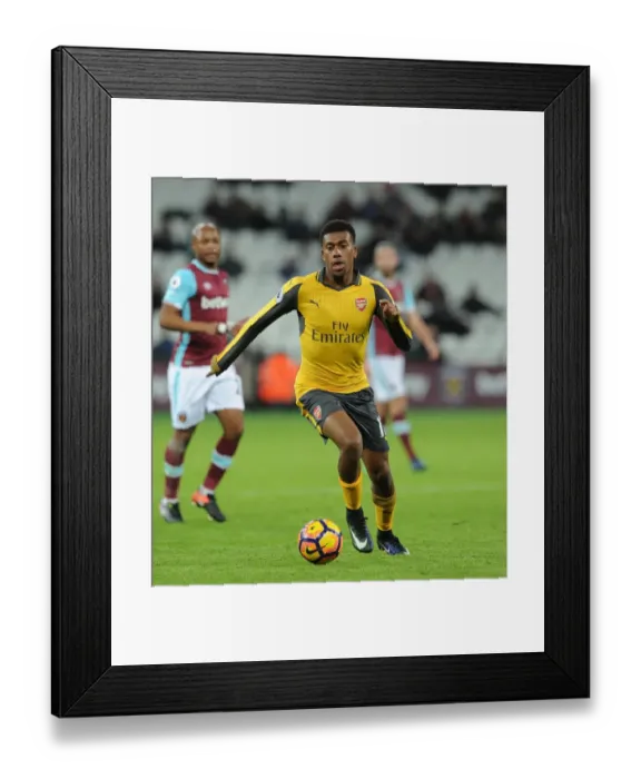 Framed Print : Alex Iwobi (Arsenal). West Ham United 1: 5 Arsenal. Premier League. London Stadium Framed Print : Alex Iwobi (Arsenal). West Ham United 1: 5 Arsenal. Premier League. London Stadium