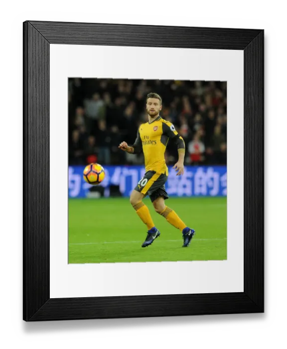 Framed Print : Shkodran Mustafi: Arsenal's Defender in Action Against West Ham United, Premier League 2016-17 Framed Print : Shkodran Mustafi: Arsenal's Defender in Action Against West Ham United, Premier League 2016-17