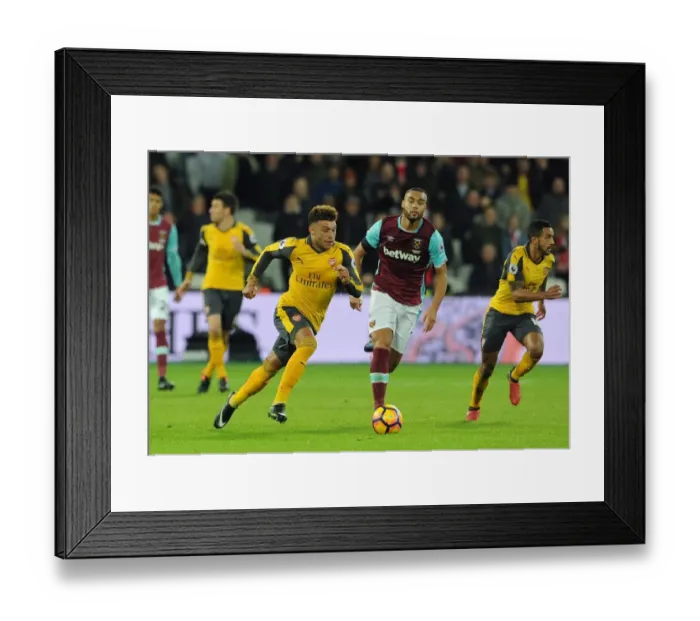 Framed Print : Alex Oxlade-Chamberlain (Arsenal) Winston Reid (West Ham). West Ham United 1: 5 Arsenal Framed Print : Alex Oxlade-Chamberlain (Arsenal) Winston Reid (West Ham). West Ham United 1: 5 Arsenal