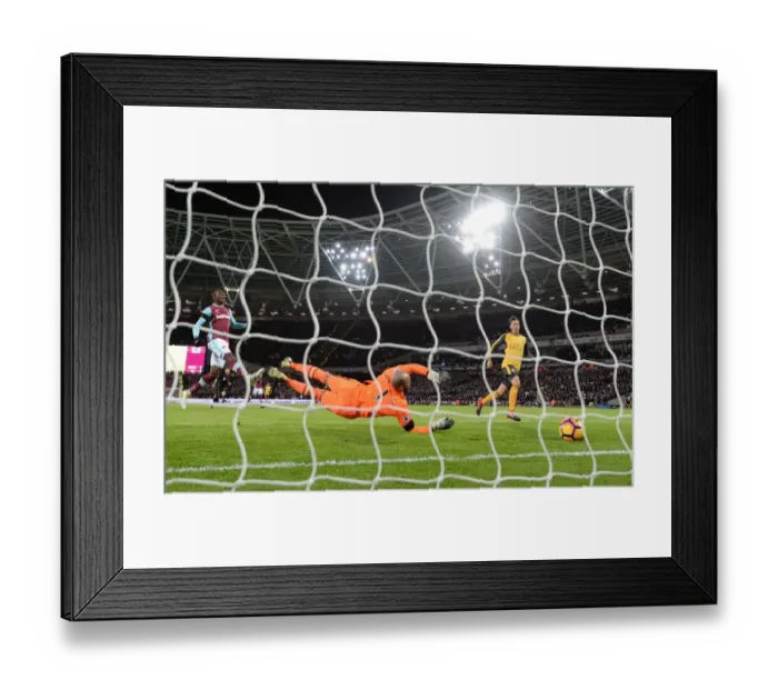 Framed Print : Mesut Ozil Scores for Arsenal Against West Ham United, December 2016 Framed Print : Mesut Ozil Scores for Arsenal Against West Ham United, December 2016