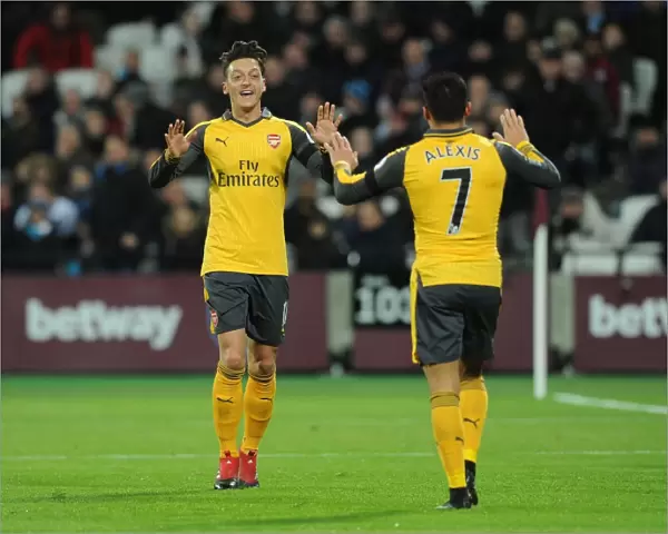 Mesut Ozil and Alexis Sanchez Celebrate Goal for Arsenal against West Ham United, 2016-17 Season
