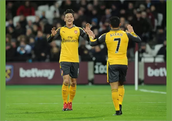 Mesut Ozil and Alexis Sanchez Celebrate Goal for Arsenal against West Ham United, 2016-17 Season