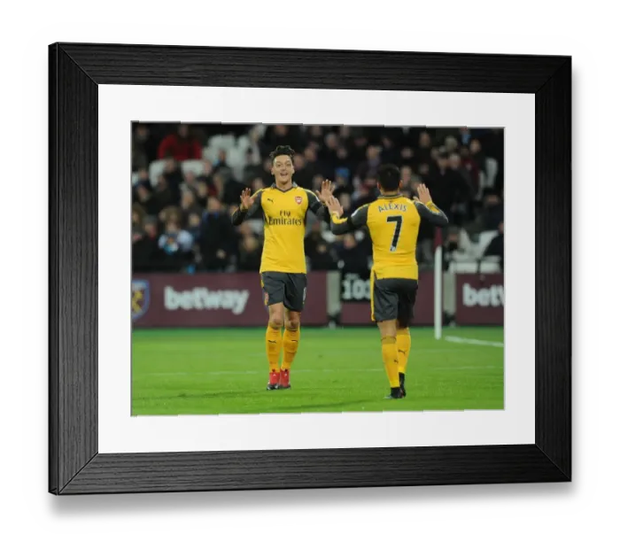 Framed Print : Mesut Ozil and Alexis Sanchez Celebrate Goal for Arsenal against West Ham United, 2016-17 Season