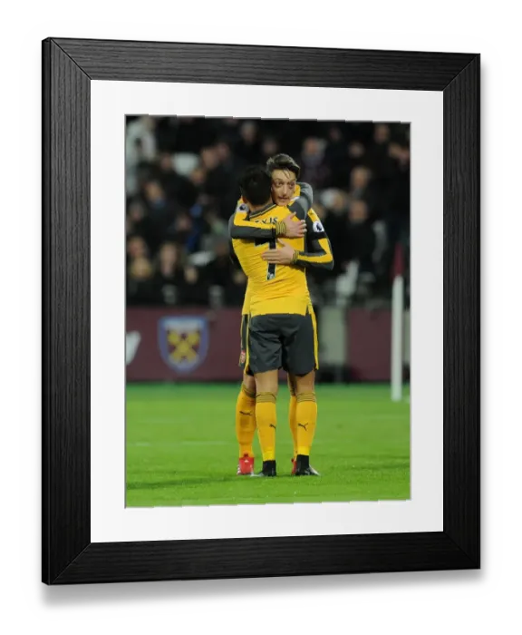 Framed Print : Arsenal Stars: Ozil and Sanchez Celebrate Goal vs. West Ham United, 2016-17 Framed Print : Arsenal Stars: Ozil and Sanchez Celebrate Goal vs. West Ham United, 2016-17