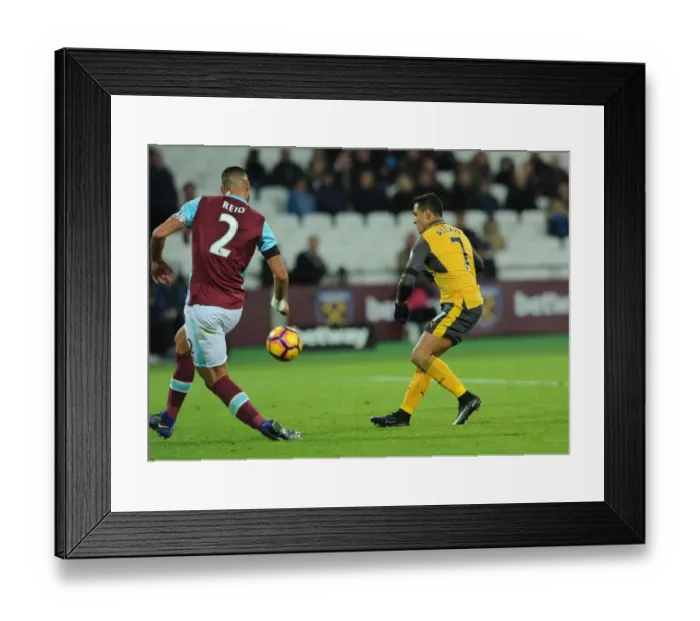 Framed Print : Alexis Sanchez Scores Thrilling Fifth Goal Against Winston Reid in West Ham vs Arsenal Premier League Clash