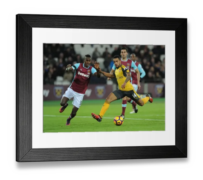 Framed Print : Intense Rivalry: Walcott vs. Fernandes - Arsenal vs. West Ham United (2016-17) Framed Print : Intense Rivalry: Walcott vs. Fernandes - Arsenal vs. West Ham United (2016-17)