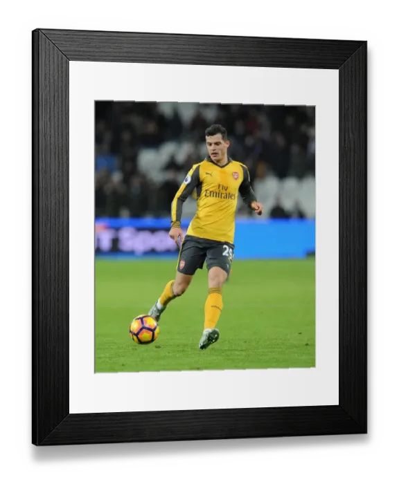 Framed Print : Arsenal's Dominance: Xhaka Shines in 5-1 Victory over West Ham (Premier League, London Stadium)