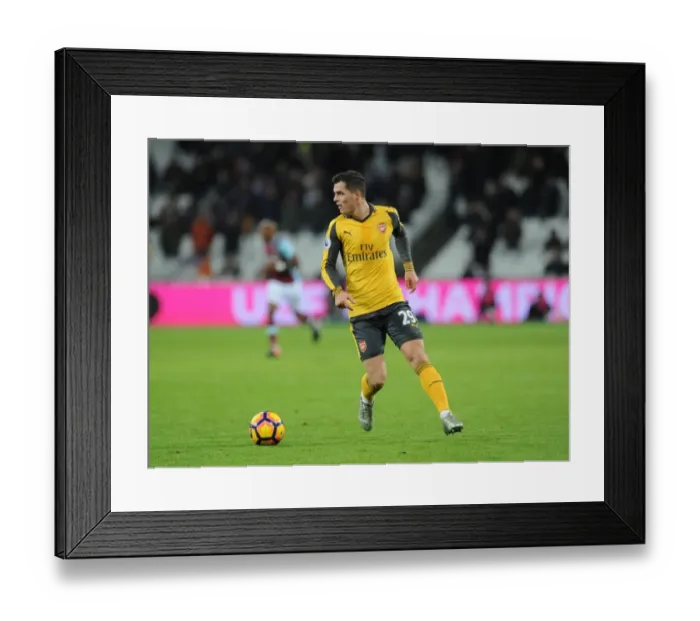Framed Print : Granit Xhaka (Arsenal). West Ham United 1: 5 Arsenal. Premier League. London Stadium Framed Print : Granit Xhaka (Arsenal). West Ham United 1: 5 Arsenal. Premier League. London Stadium
