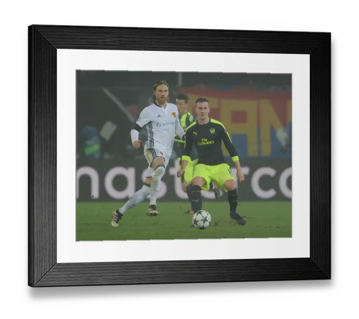 Framed Print : Arsenal vs. FC Basel: Clash in the UEFA Champions League