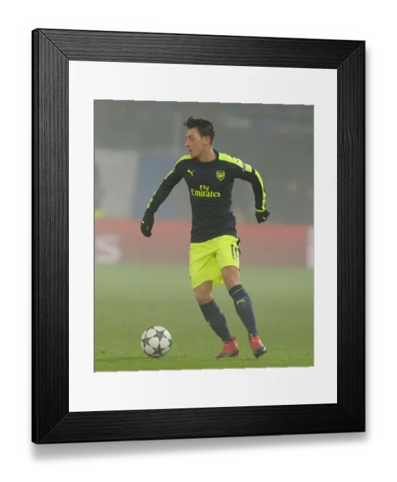 Framed Print : Mesut Ozil's Standout Show: Arsenal's Victory Over FC Basel in the 2016-17 UEFA Champions League Framed Print : Mesut Ozil's Standout Show: Arsenal's Victory Over FC Basel in the 2016-17 UEFA Champions League