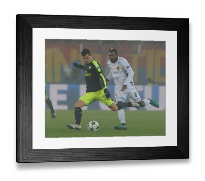 Framed Print : Granit Xhaka Breaks Past Basel's Geoffroy Serey Die: Arsenal vs FC Basel, UEFA Champions League, 2016