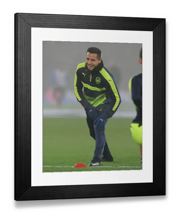 Framed Print : Alexis Sanchez's Pre-Match Ritual: Gearing Up for FC Basel Showdown in Champions League (December 2016)