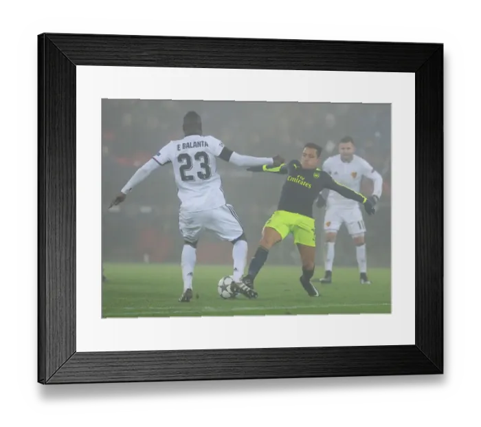 Framed Print : Arsenal's Alexis Sanchez Faces Off Against Basel's Eder Balanta in 2016-17 UEFA Champions League Clash Framed Print : Arsenal's Alexis Sanchez Faces Off Against Basel's Eder Balanta in 2016-17 UEFA Champions League Clash
