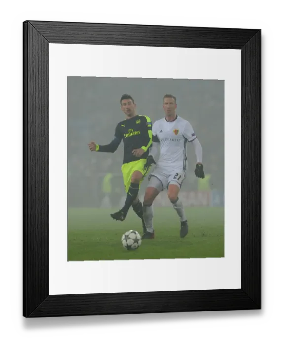 Framed Print : Arsenal's Laurent Koscielny Faces Off Against Marc Janko of FC Basel in 2016-17 UEFA Champions League Framed Print : Arsenal's Laurent Koscielny Faces Off Against Marc Janko of FC Basel in 2016-17 UEFA Champions League