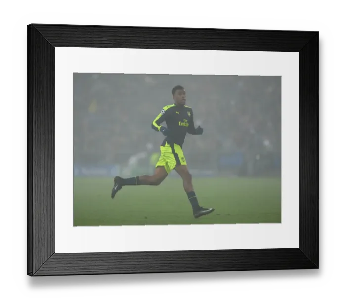 Framed Print : Arsenal's Alex Iwobi in Action during the 2016-17 UEFA Champions League Match against FC Basel Framed Print : Arsenal's Alex Iwobi in Action during the 2016-17 UEFA Champions League Match against FC Basel