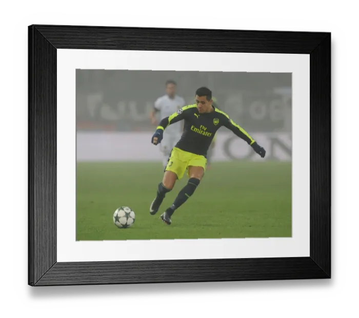 Framed Print : Arsenal's Alexis Sanchez in Action against FC Basel during the 2016-17 UEFA Champions League
