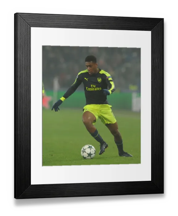 Framed Print : Arsenal's Alex Iwobi in Action against FC Basel during the 2016-17 UEFA Champions League Framed Print : Arsenal's Alex Iwobi in Action against FC Basel during the 2016-17 UEFA Champions League