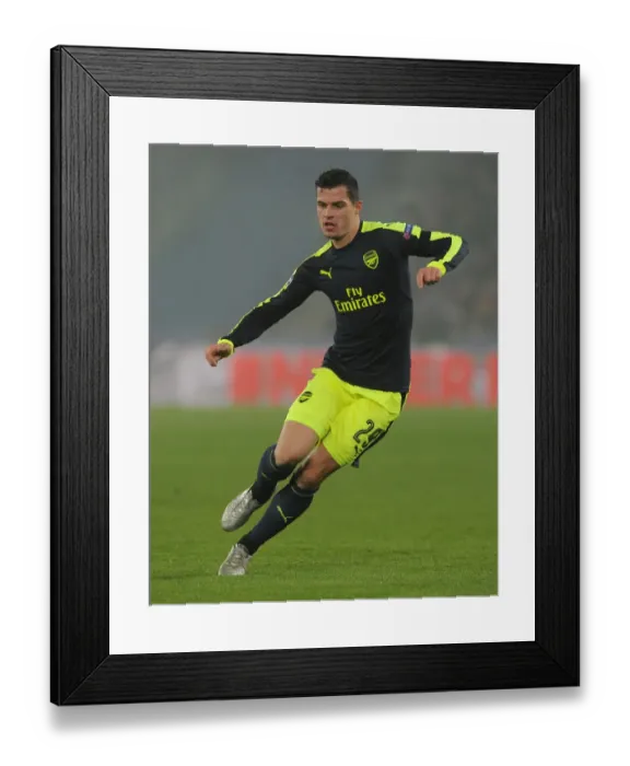 Framed Print : Granit Xhaka in Action: Arsenal vs. FC Basel, UEFA Champions League, Switzerland (December 2016)
