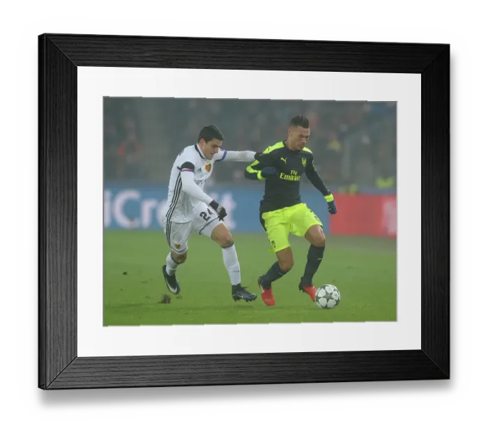 Framed Print : Arsenal's Kieran Gibbs Clashes with Basel's Mohamed Elyounoussi in 2016-17 UEFA Champions League Framed Print : Arsenal's Kieran Gibbs Clashes with Basel's Mohamed Elyounoussi in 2016-17 UEFA Champions League