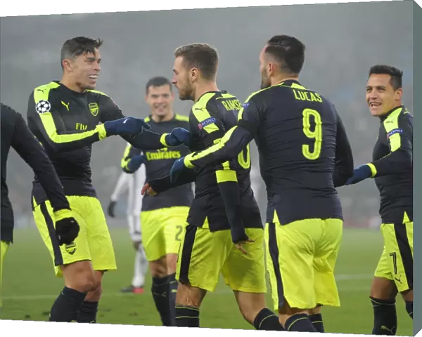 Lucas Perez celebrates scoring his and Arsenals 3rd goal with Gabriel and Alexis