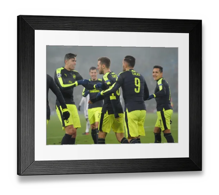 Framed Print : Lucas Perez celebrates scoring his and Arsenals 3rd goal with Gabriel and Alexis