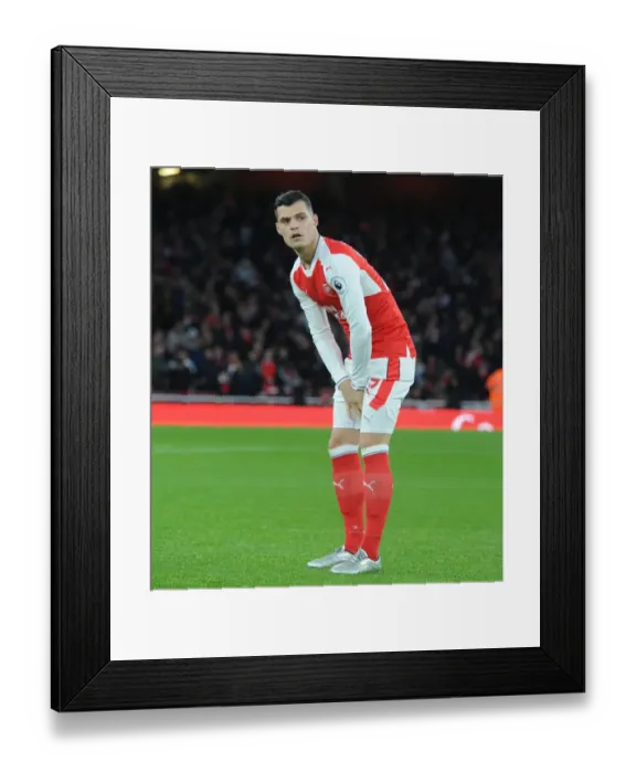 Framed Print : Arsenal's Granit Xhaka Prepares for Stoke City Clash (Premier League 2016-17) Framed Print : Arsenal's Granit Xhaka Prepares for Stoke City Clash (Premier League 2016-17)