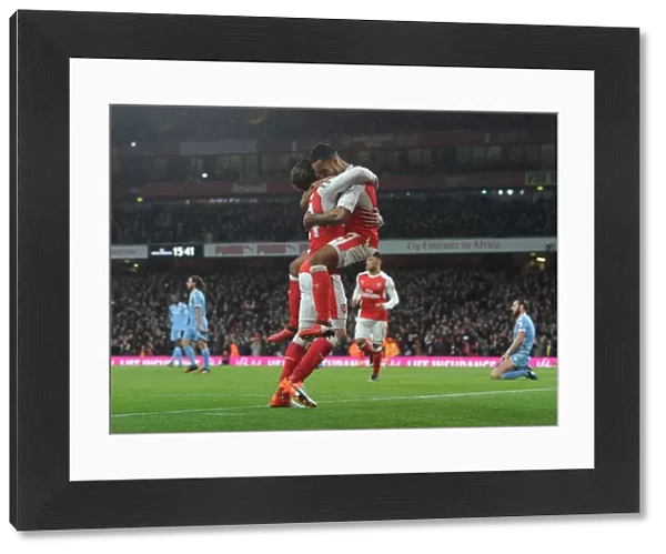 Arsenal's Theo Walcott and Hector Bellerin Celebrate Goal Against Stoke City (2016-17)