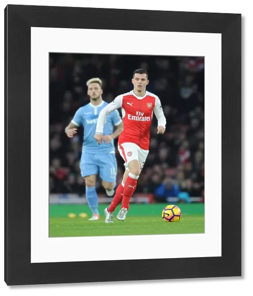 Granit Xhaka: Arsenal's Midfield Maestro Shines in Arsenal vs. Stoke City (Premier League 2016-17)