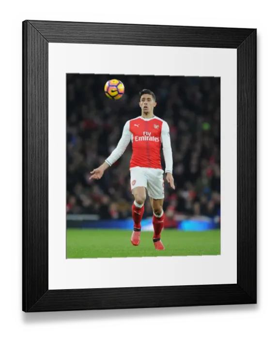 Framed Print : Arsenal's Gabriel Faces Off Against Stoke City in the Premier League