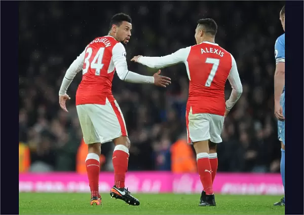 Arsenal's Coquelin and Sanchez in Action against Stoke City (2016-17)