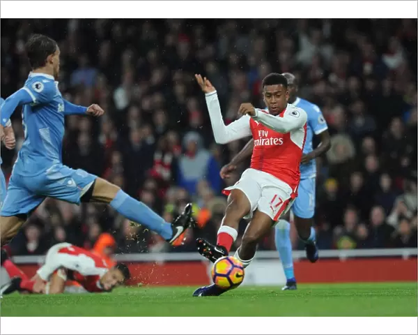 Alex Iwobi Scores Third Goal Against Marc Muniesa in Arsenal's Victory over Stoke City (2016-17)
